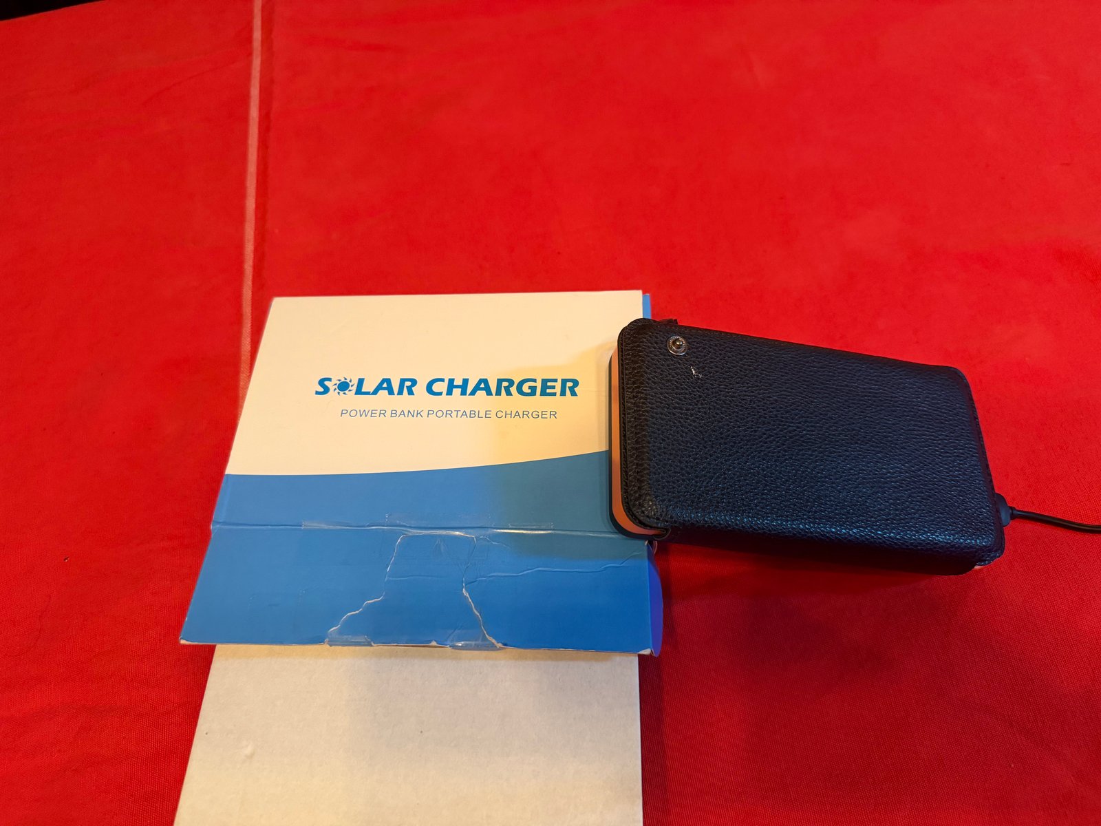 Carregador Solar Portátil Dobrável Preto e Laranja